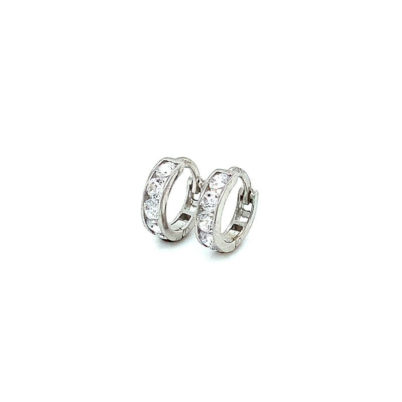 Huggies con circones en oro blanco 10kt.