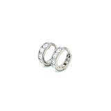 Huggies con circones en oro blanco 10kt.