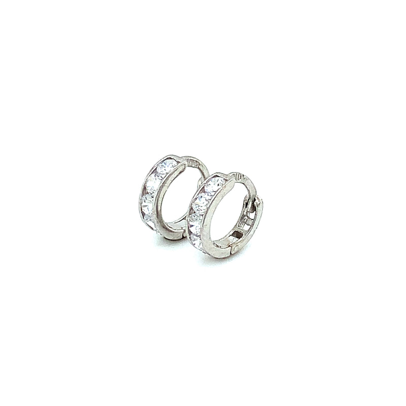 Huggies con circones en oro blanco 10kt.
