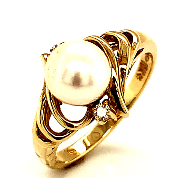 Anillo de perla con diamante en oro amarillo 10kt.  ANTES:  $399.00