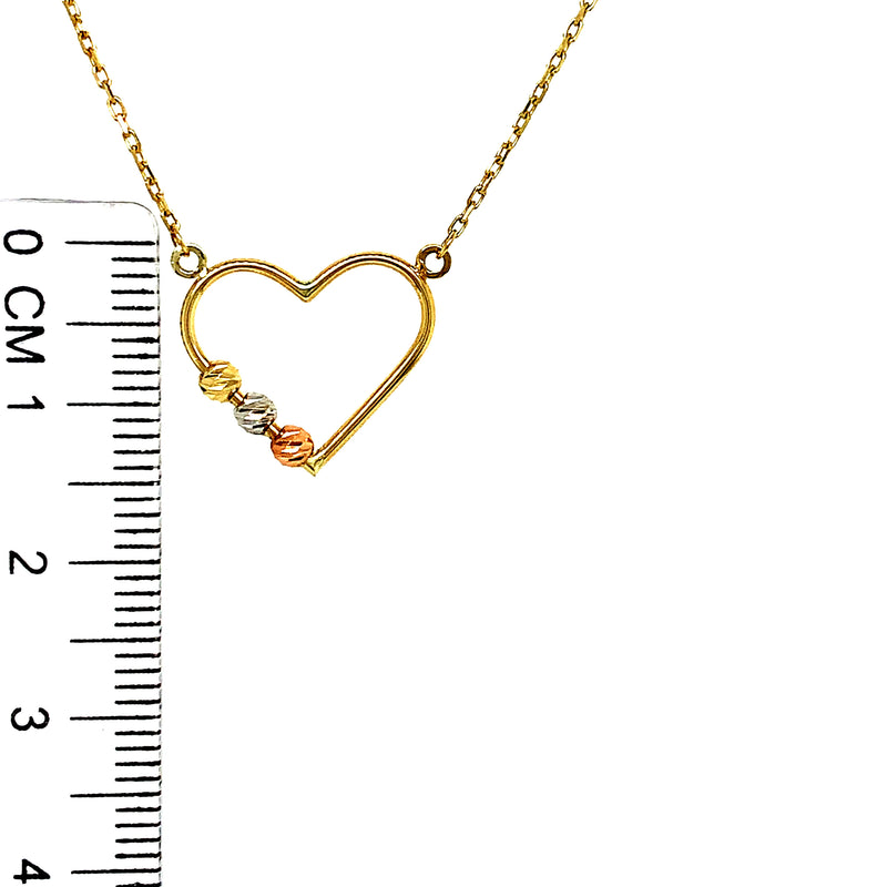 Collar de corazón con bolitas en oro tres tonos 10kt. 45cm