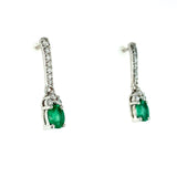 Aretes de esmeraldas con diamantes en oro blanco 14kt.