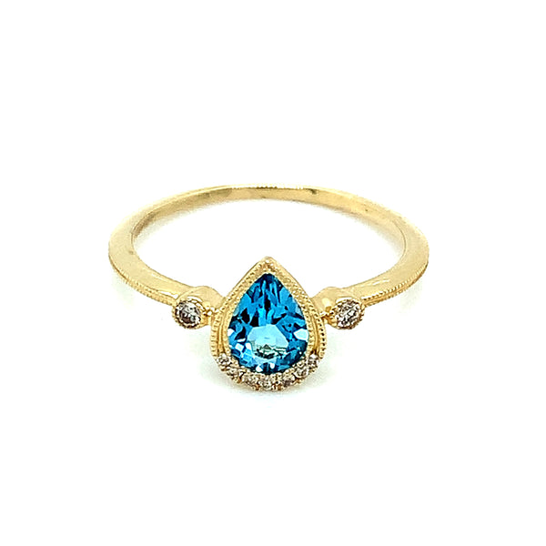 Anillo de topacio azul con diamantes en oro amarillo 10kt