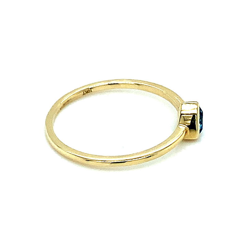 Anillo de topacio azul en oro amarillo 10kt ANTES: $199.00