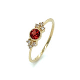 Anillo de granate con diamantes en oro amarillo 10kt.