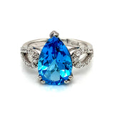 Anillo de topacio azul con circones en plata 925 ANTES: $225.00