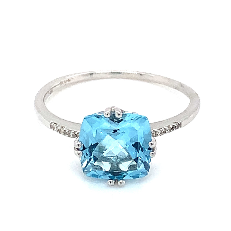 Anillo de topacio azul con diamantes en oro blanco 14k