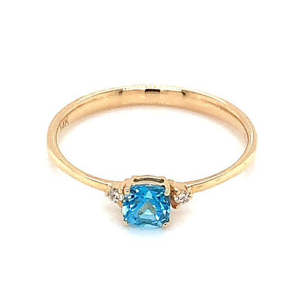 Anillo de topacio azul con diamantes en oro amarillo 14k
