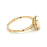 Anillo de ópalo con diamantes en oro amarillo 14kt.