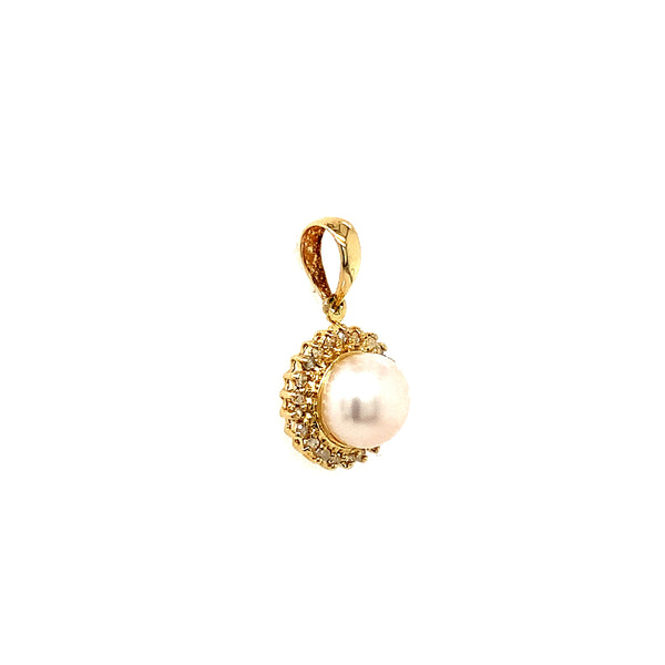 Dije de perla en oro amarillo 14KT  ANTES:  $299.00
