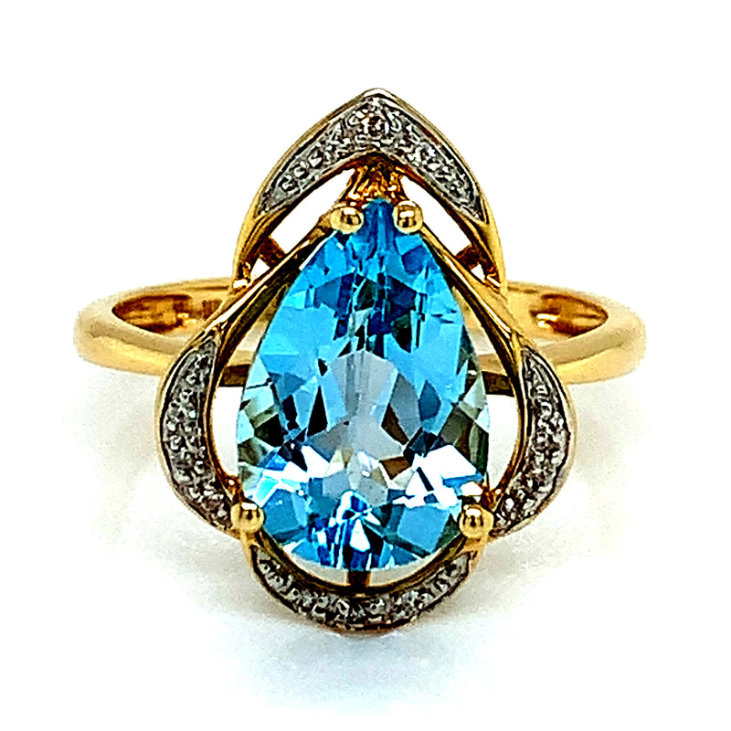 Anillo de topacio azul con diamantes en oro amarillo 14k