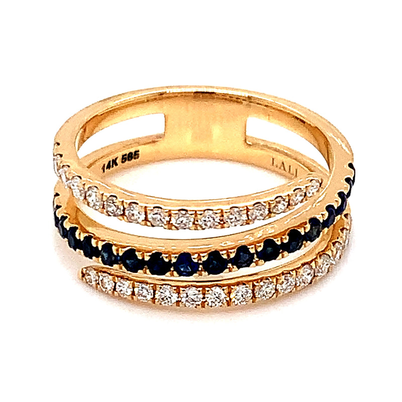 Anillo de zafiro con diamantes en oro amarillo 14kt.