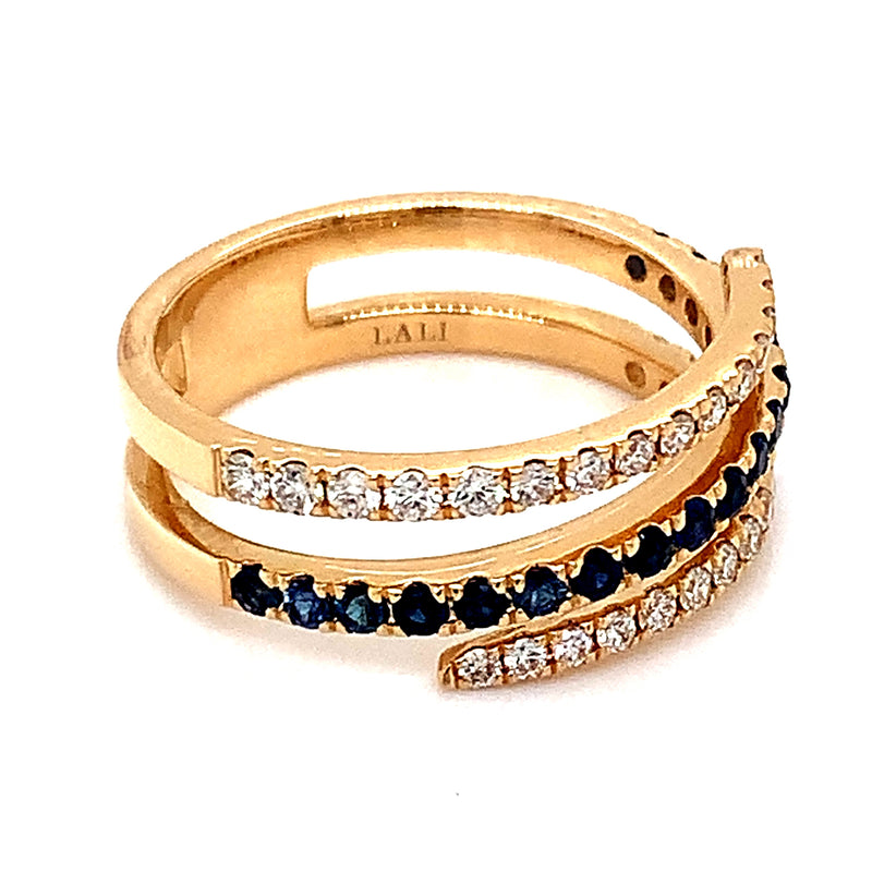 Anillo de zafiro con diamantes en oro amarillo 14kt.