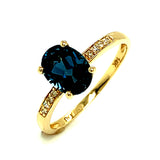 Anillo de Topacio Azul con diamantes 14kt.