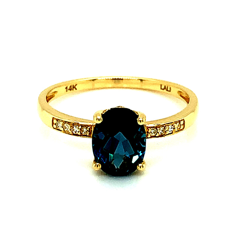 Anillo de Topacio Azul con diamantes 14kt.