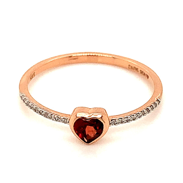 Anillo de granate con diamantes en oro rosado 14kt.