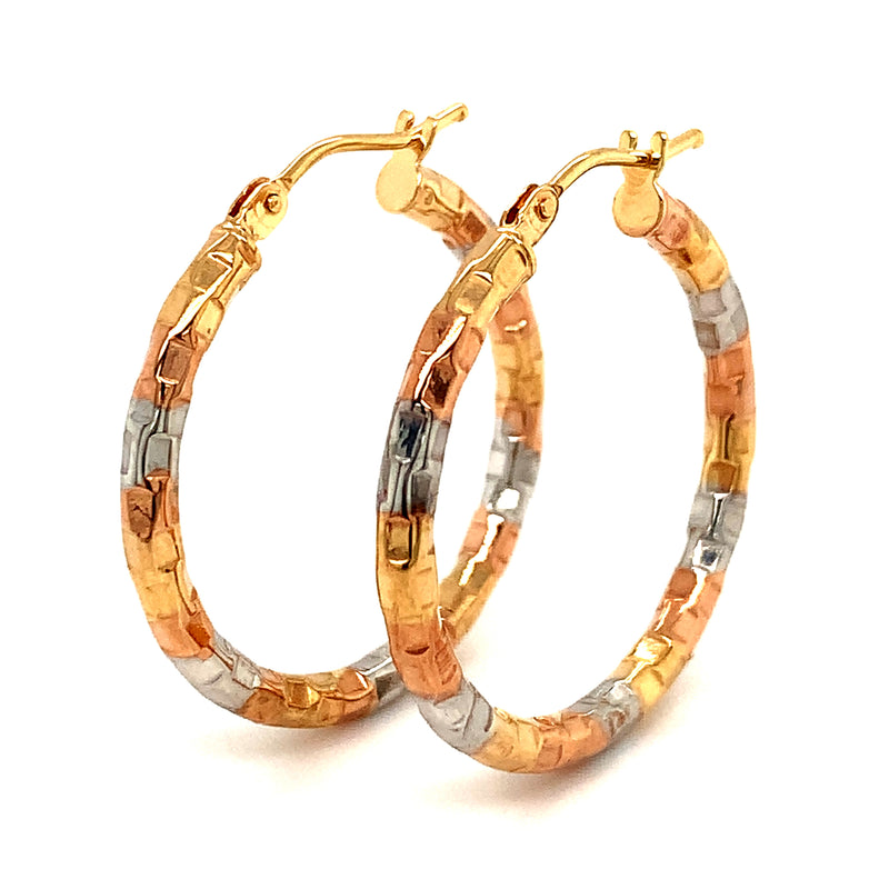 Argollas en oro tres tonos 10kt.