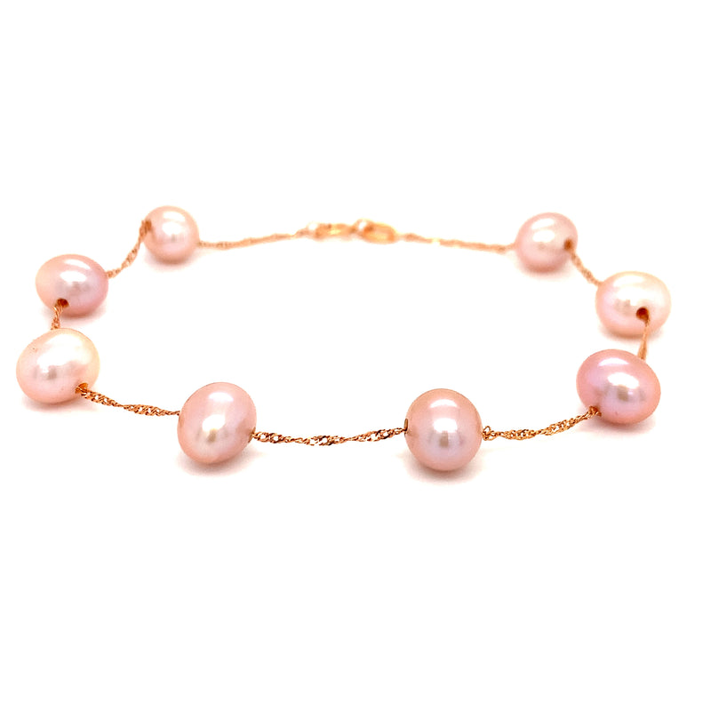 Pulsera de perlas rosadas en oro rosado 14Kt. 19cm