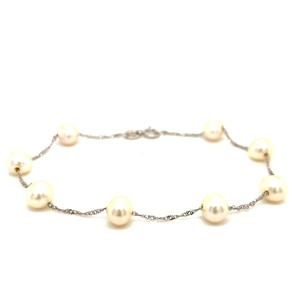 Pulsera de perlas blancas en oro blanco 14kt. 19cm