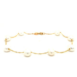 Pulsera de perlas blancas en oro amarillo 14Kt. 19cm