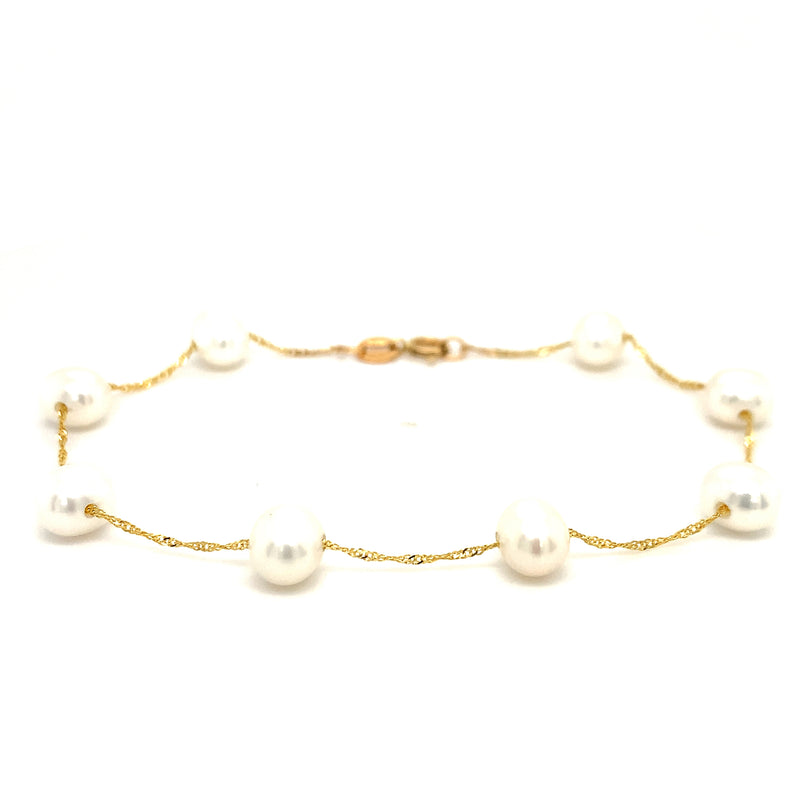 Pulsera de perlas blancas en oro amarillo 14Kt. 19cm