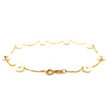 Pulsera de perlas blancas en oro amarillo 14Kt. 19cm