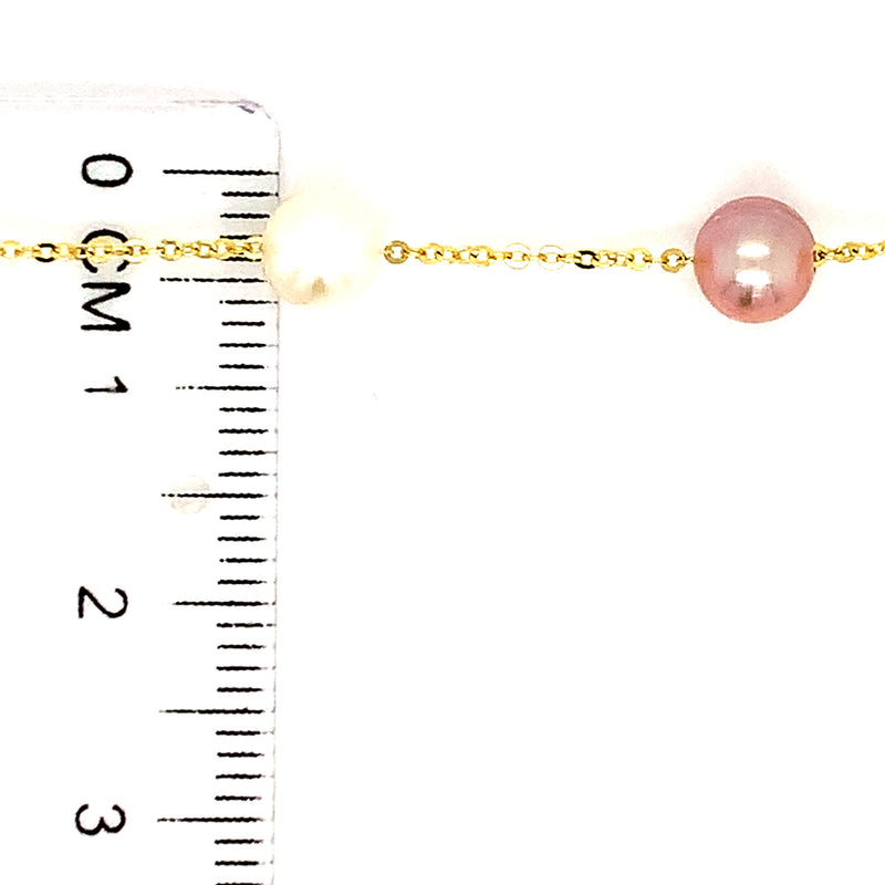 Pulsera de perlas blancas, rosadas y moradas en oro amarillo 14kt. 19.5cm