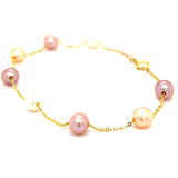 Pulsera de perlas blancas, rosadas y moradas en oro amarillo 14kt. 19.5cm