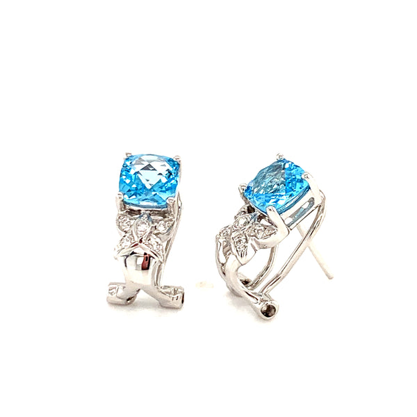 Aretes de topacio azul con diamantes en oro blanco 14kt.