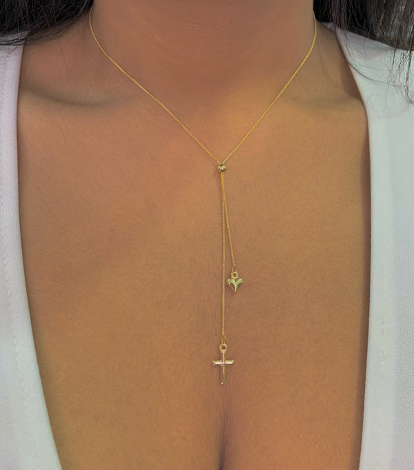 Collar tipo corbatín (corazón y cruz) en oro amarillo 10k. 45cm