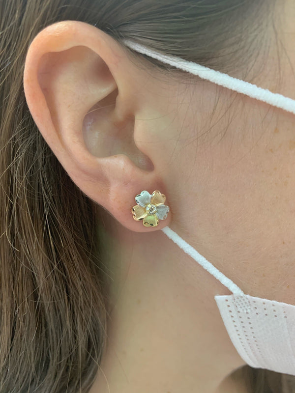 Aretes (flor) en oro tres tonos 10k