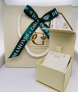 Aretes para bebés con circones en oro amarillo 18kt.