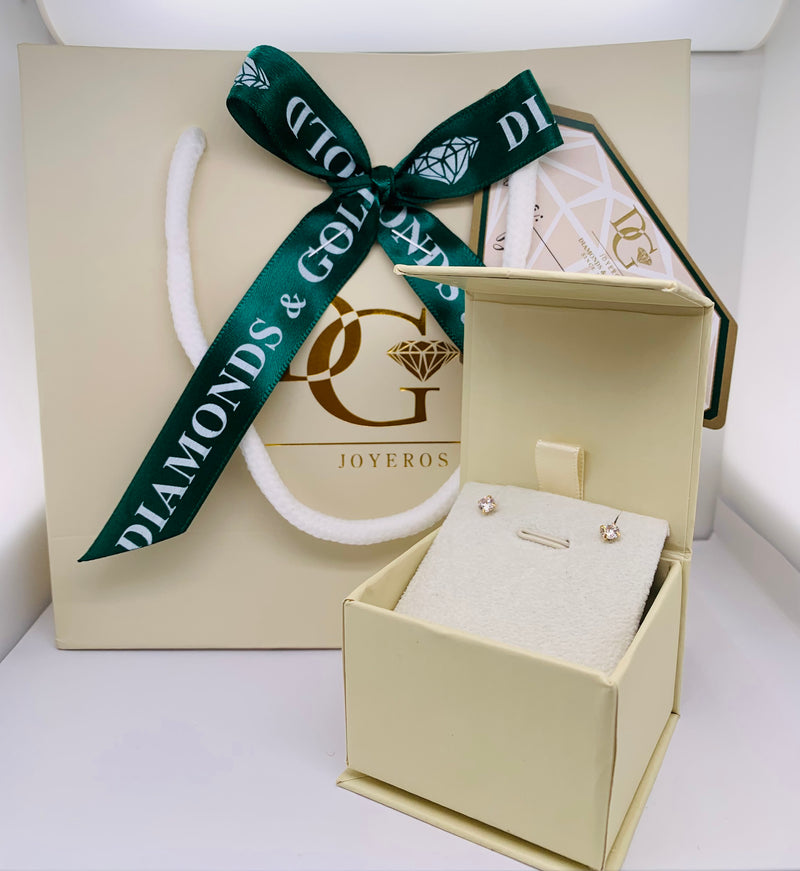 Aretes para bebés con circones en oro amarillo 18kt.