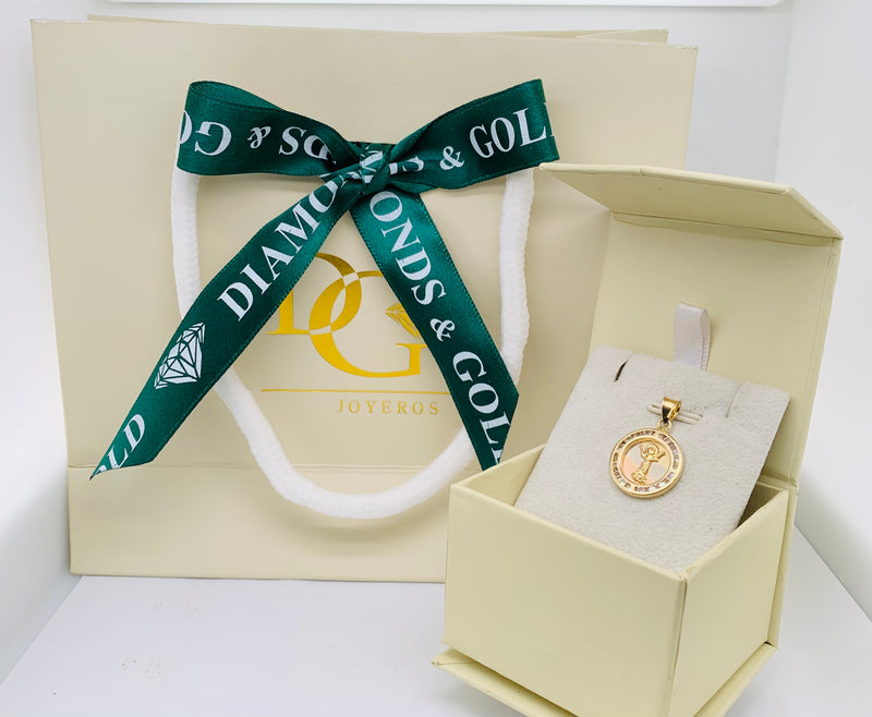 Dije (Divino Niño) en oro tres tonos 10k