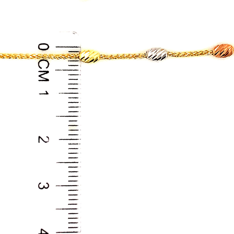 Pulsera ajustable de bebé en oro tres tonos 10kt