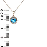 Collar de topacio azul con diamantes en oro blanco 14kt. BT-0.59CTS. D-0.07CTS.