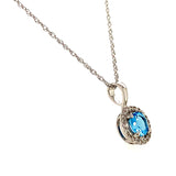 Collar de topacio azul con diamantes en oro blanco 14kt. BT-0.59CTS. D-0.07CTS.