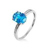 Anillo de topacio azul con diamantes en oro blanco 14kt. BT-1.18CTS. D-0.03CTS.