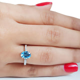 Anillo de topacio azul con diamantes en oro blanco 14kt. BT-1.18CTS. D-0.03CTS.