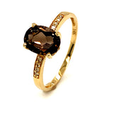 Anillo de topacio humo con diamantes en oro amarillo 14kt. QS-1.5CTS. D-0.03CTS.