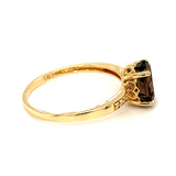 Anillo de topacio humo con diamantes en oro amarillo 14kt. QS-1.5CTS. D-0.03CTS.
