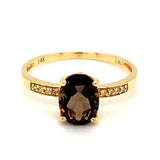 Anillo de topacio humo con diamantes en oro amarillo 14kt. QS-1.5CTS. D-0.03CTS.
