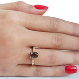 Anillo de topacio humo con diamantes en oro amarillo 14kt. QS-1.5CTS. D-0.03CTS.