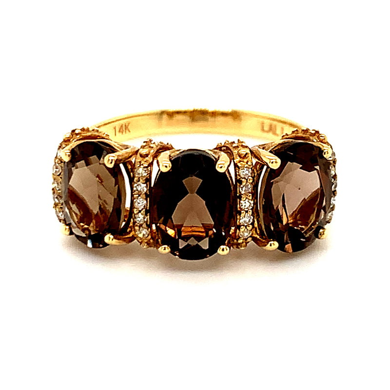 Anillo de topacio humo con diamantes en oro amarillo 14kt.