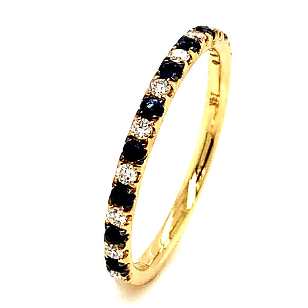 Anillo de zafiro con diamantes en oro amarillo 14kt.